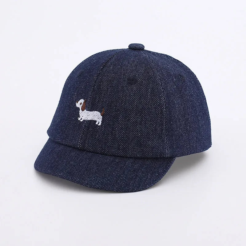 Denim puppy baseball cap for babies with 48cm head circumference in light blue