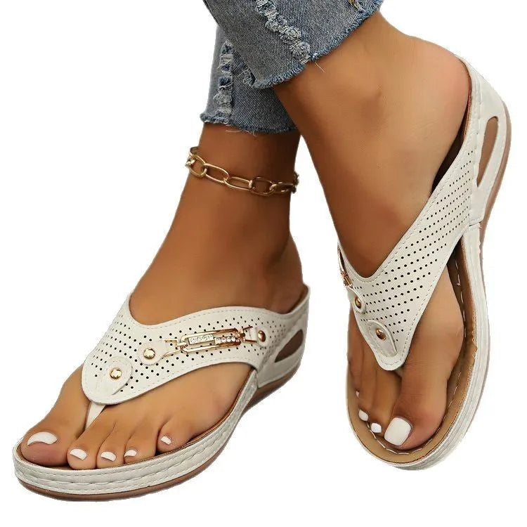 Women's retro flip-flop sandals with herringbone pattern, shown in light brown colour.