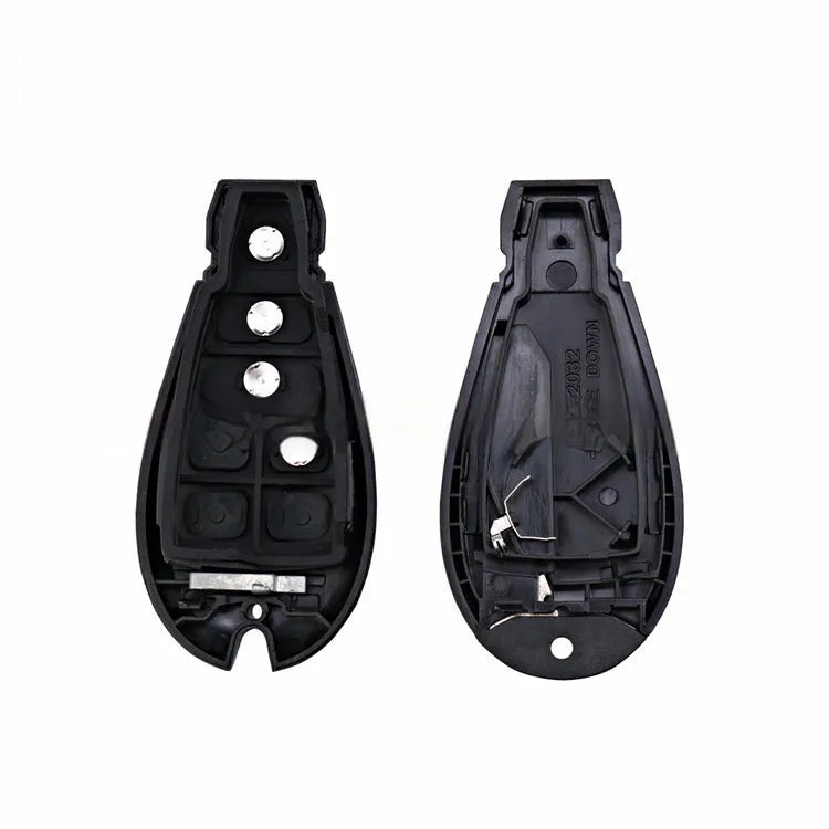 Blank Dodge car key shell case made of black ABS plastic, showing brass contacts inside, dimensions 85x42x15mm.