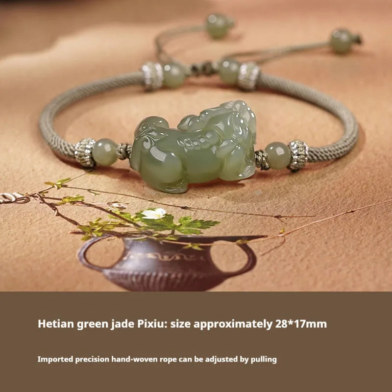 Traditional Chinese Hetian jade bracelet with black and red braided ropes and jade beads on elastic cord