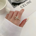 Rotating micro inlaid ring with spinning windmill design in gold or silver finish