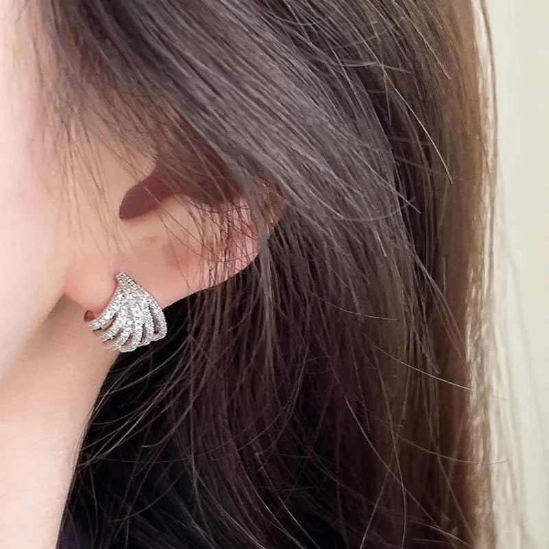 Women's geometric earrings in platinum colour with zircon construction and electroplated finish