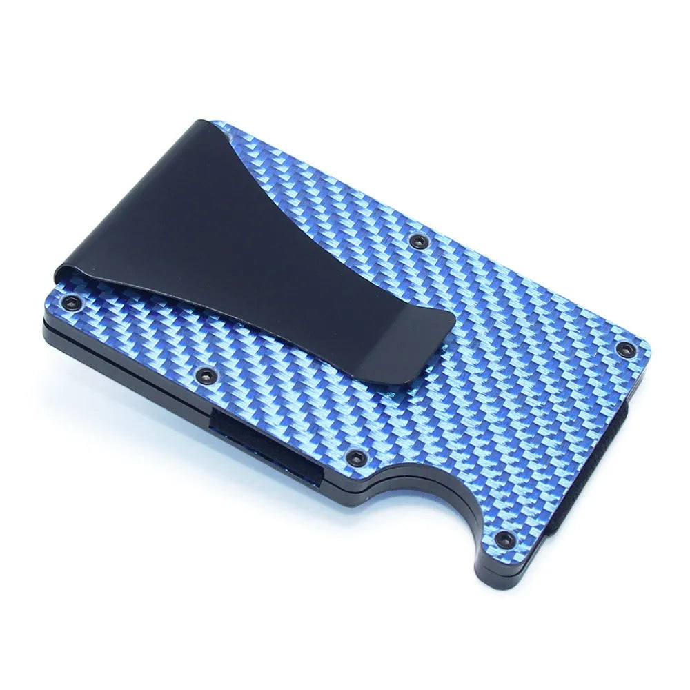 A slim carbon fibre card holder wallet in a geometric design, shown with business cards.