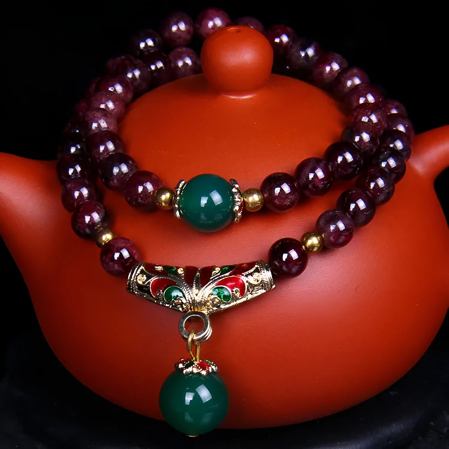 Natural garnet bracelet with 7mm beads, golden toad charm and adjustable double-ring clasp