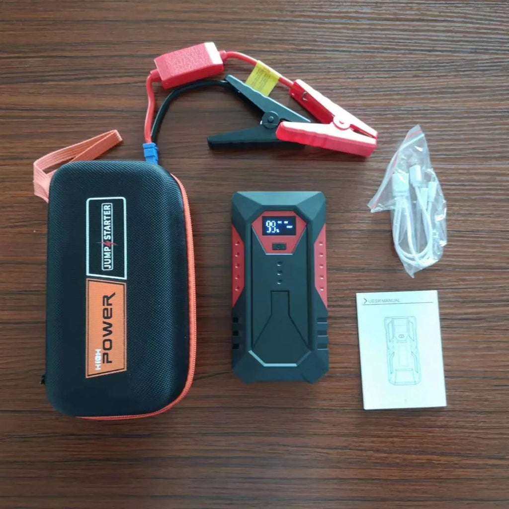 Red 12V car jump starter with battery clamps and 18800mAh capacity for emergency vehicle starting