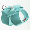 Puppy wearing microfiber chest strap with bowknot design in pink, blue, or orange colour