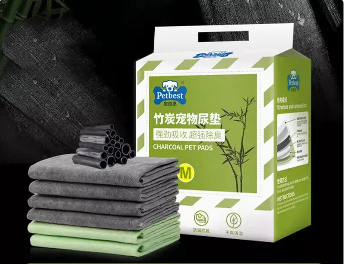 Pack of thickened, absorbent dog urine pads showing lemon scent, blue classic, and bamboo charcoal variants in different sizes.