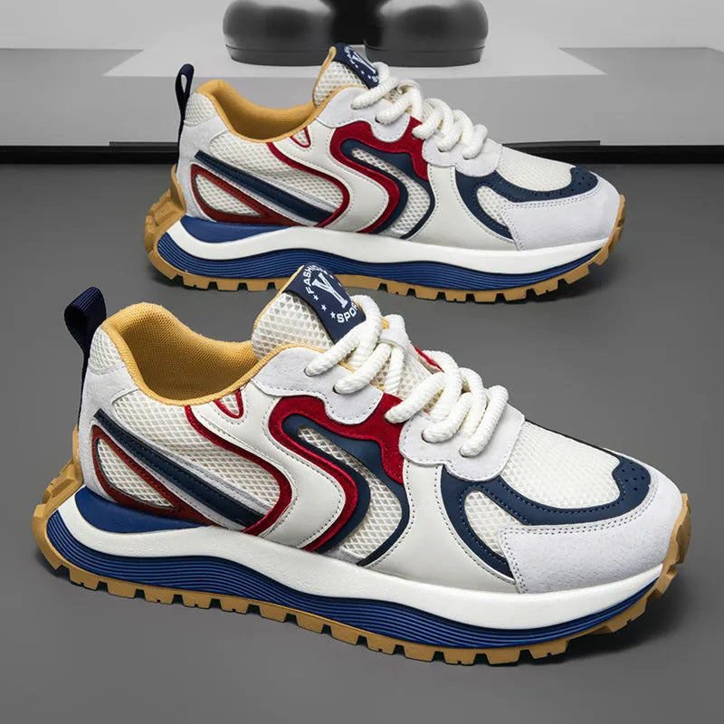 Men's yellow synthetic leather and mesh casual sneaker with rubber sole and lace-up front.