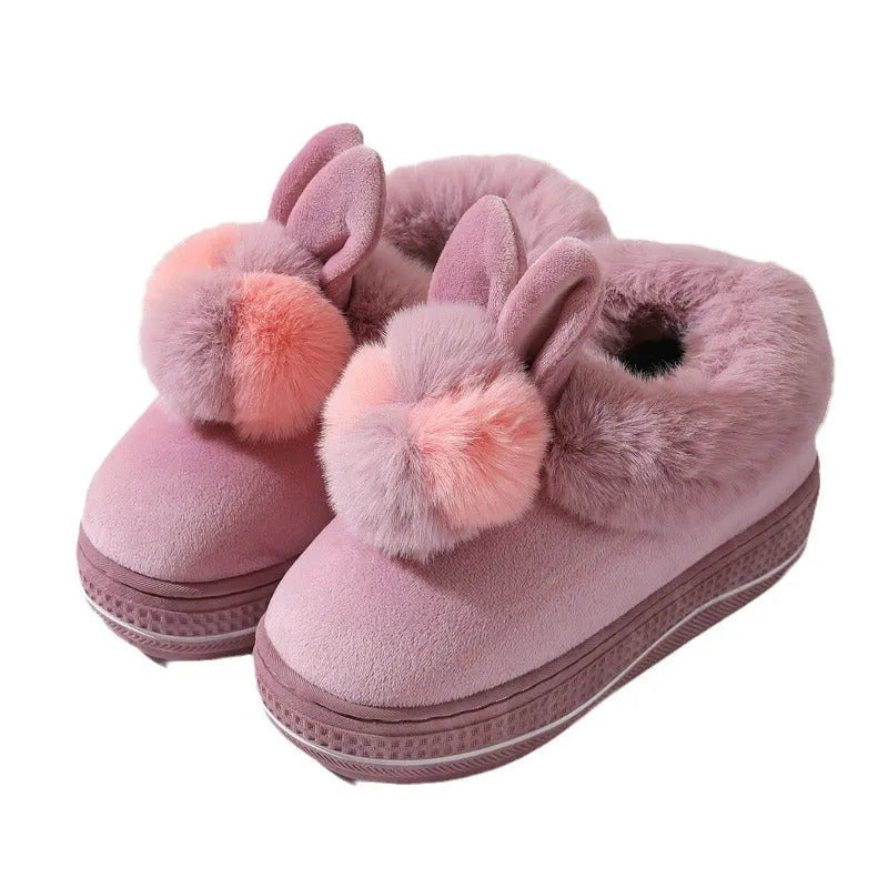Black thick-soled high heel winter slipper with plush upper and textured TPR sole.