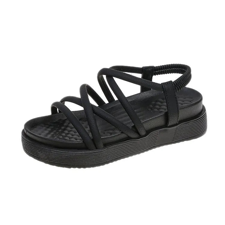 Women's black Roman platform sandals with a round toe strap and textured TPR sole.