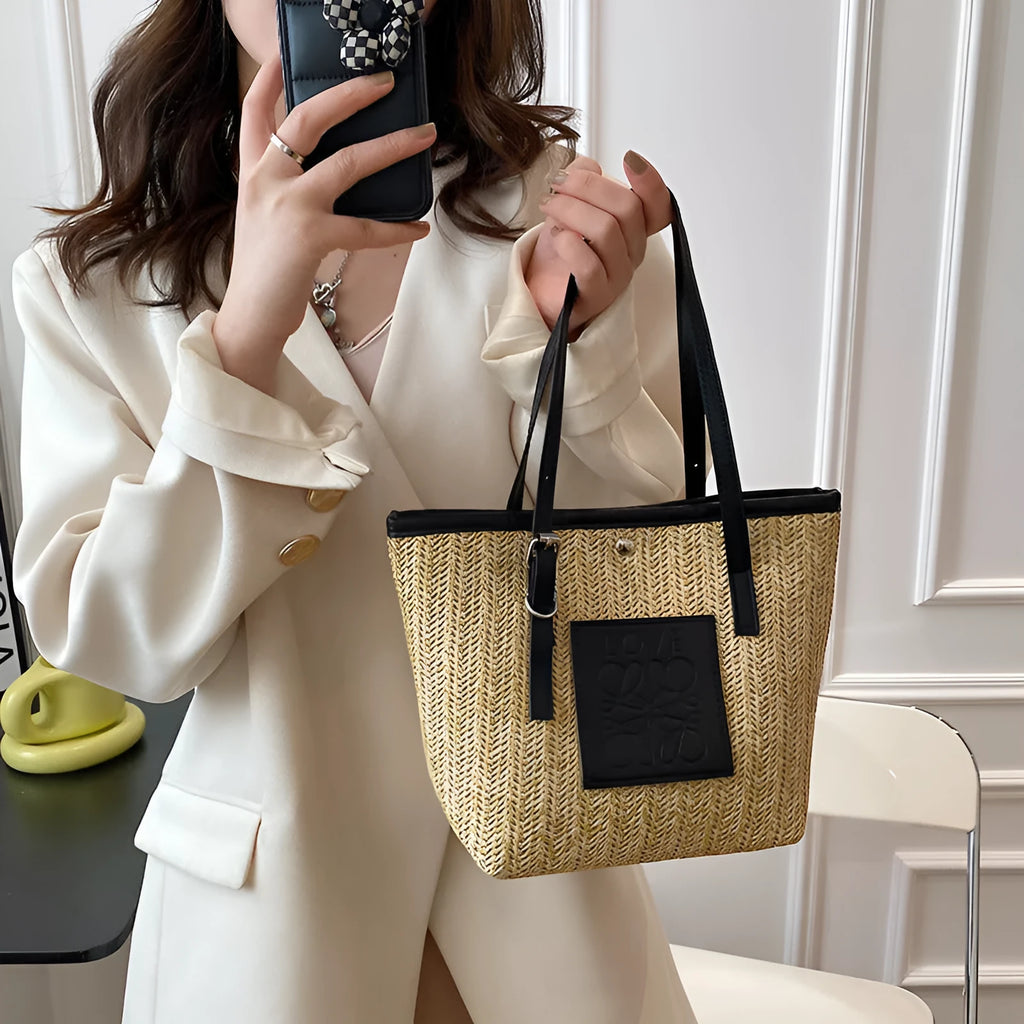 Women's retro style straw woven shoulder bag in black with large capacity and three-dimensional pocket