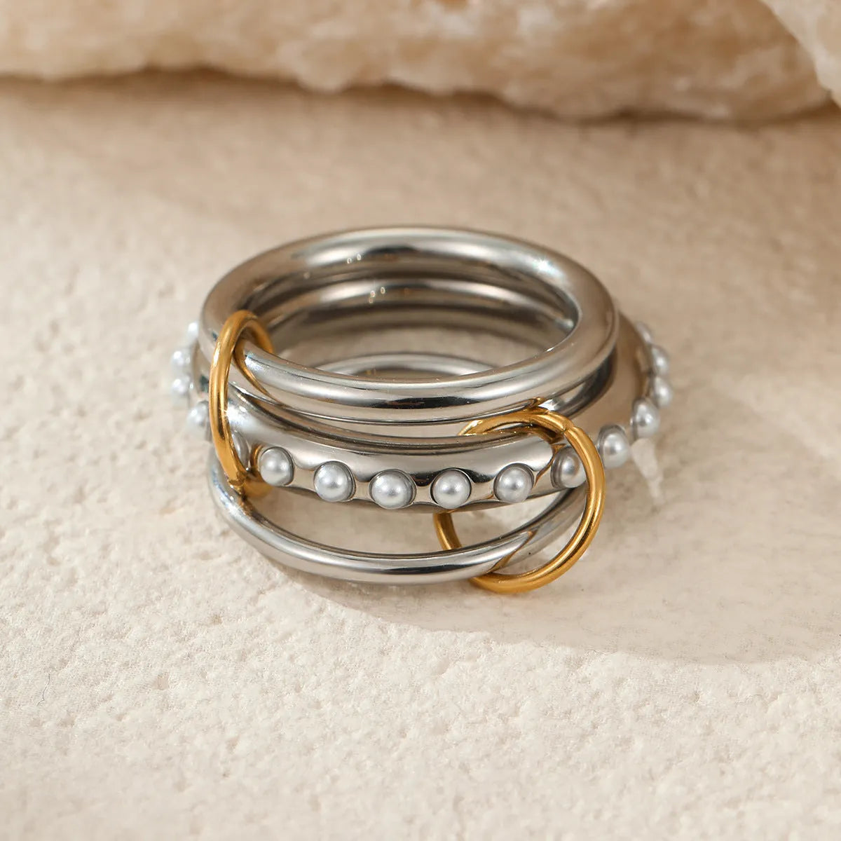 Women's stainless steel stacked ring set with 18K gold plating in three colour variations