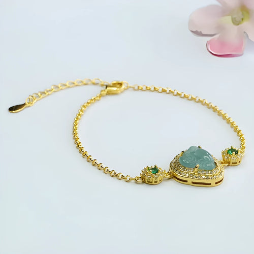 Emerald blue water Buddha jade bracelet for women showing 10x13mm dimensions and inlaid details