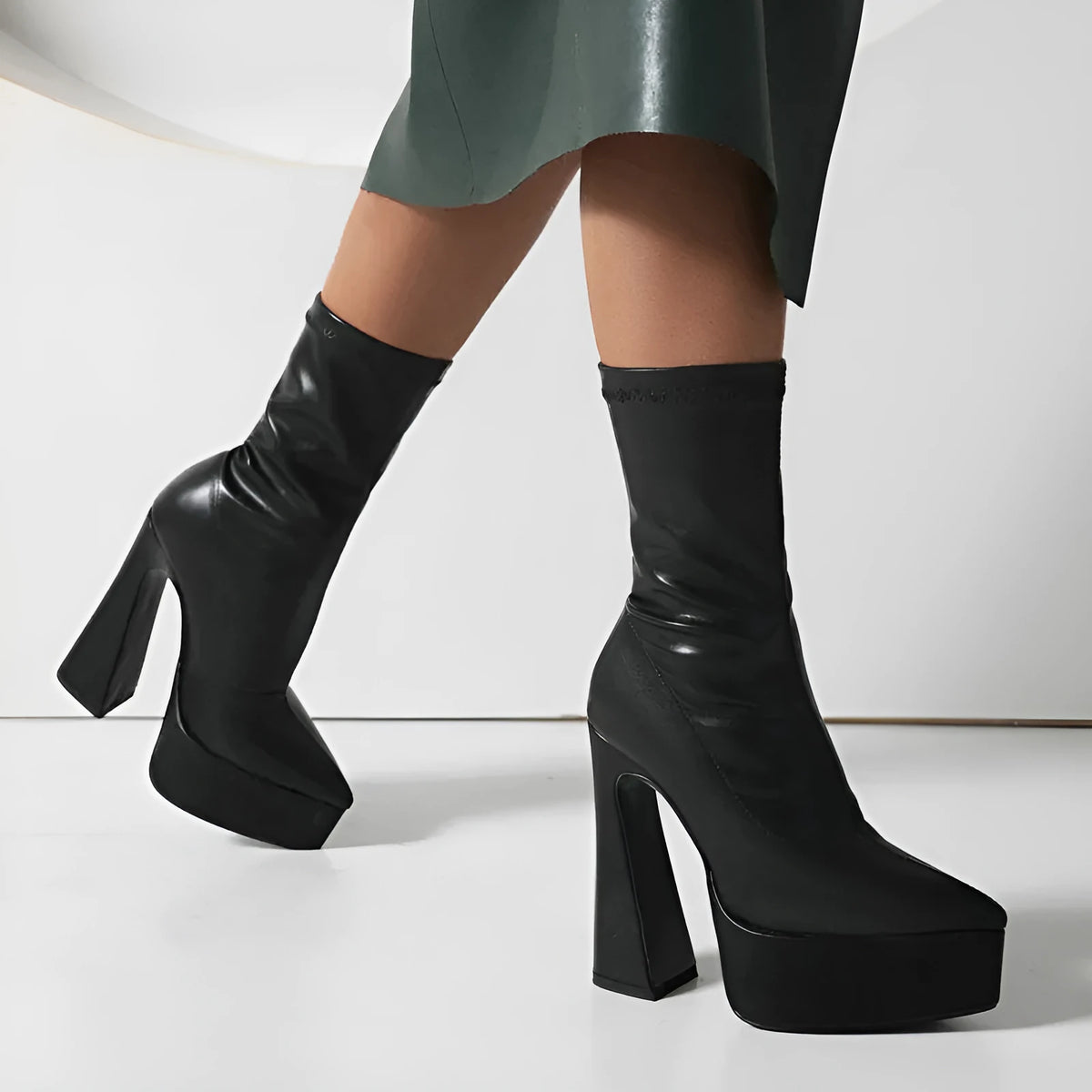 Women's thick heel super high heel platform booties in black with artificial PU upper and rubber sole