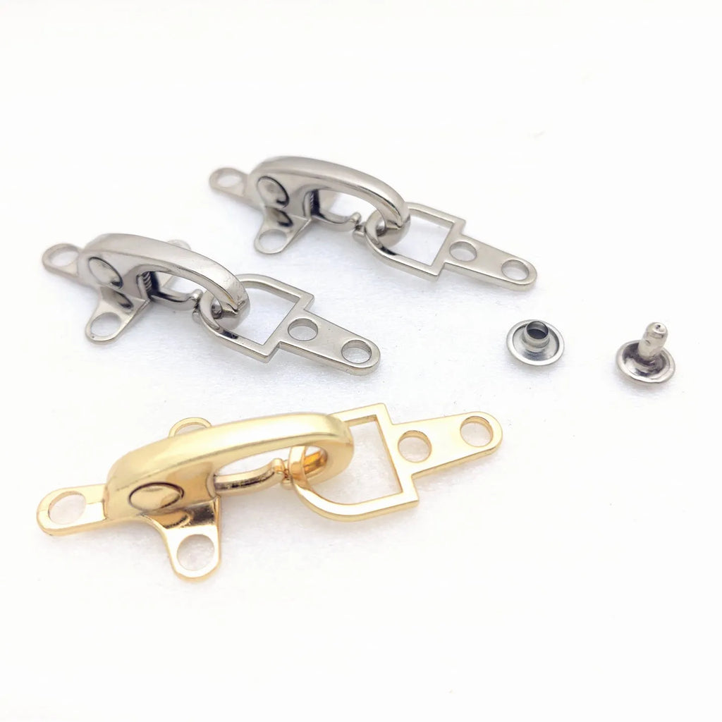 Alloy metal aircraft buckle decoration measuring 5.85cm in bronze, gold, gun colour, and silver finishes