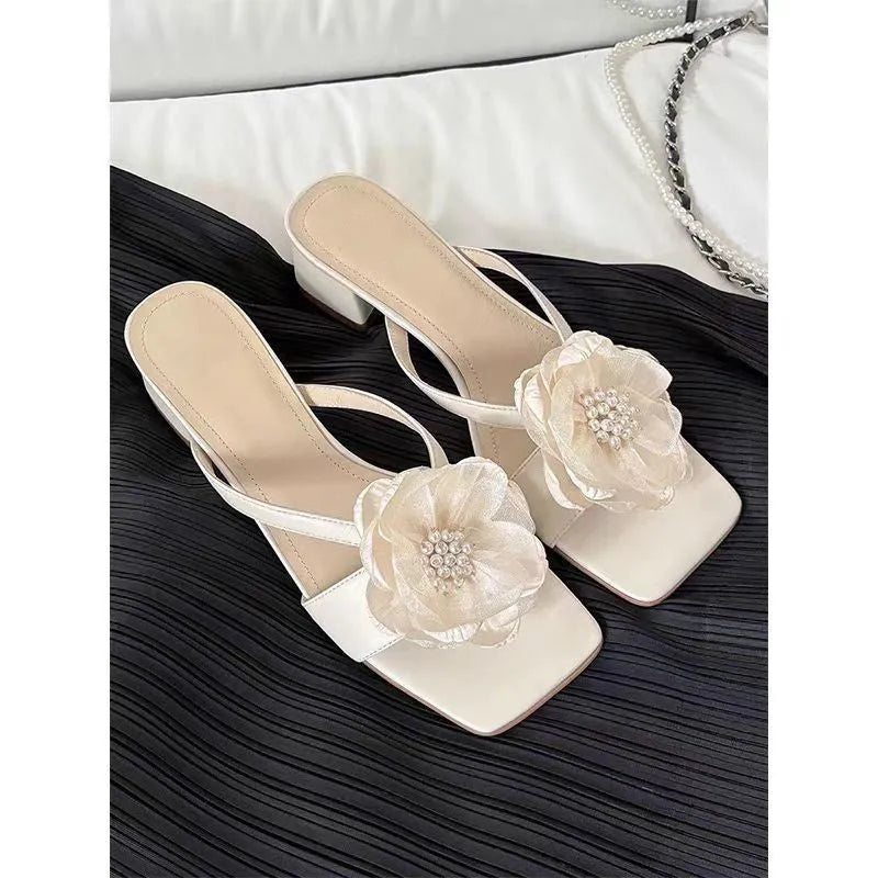 Women's sandals with chunky heel, square toe, flower embellishment on satin strap in cream-white colour