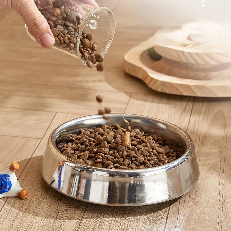 Thick stainless steel pet bowl with non-slip base, anti-fall rim, and bite-resistant construction