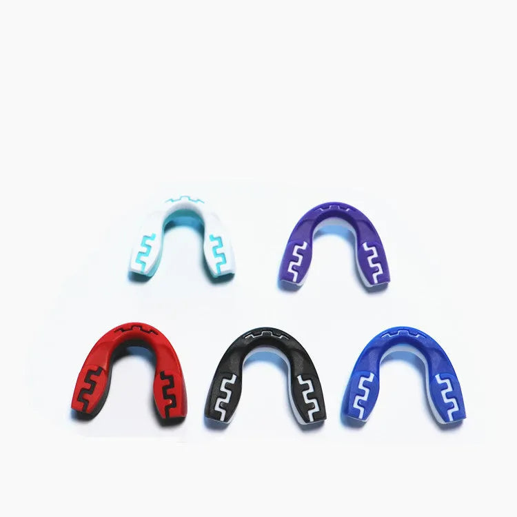 Adult boxing mouthguard with tooth socket design in black and white printed teeth graphic