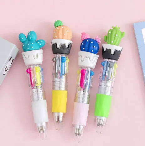 Cartoon four-colour press ballpoint pen with 0.7mm tip in random cute design