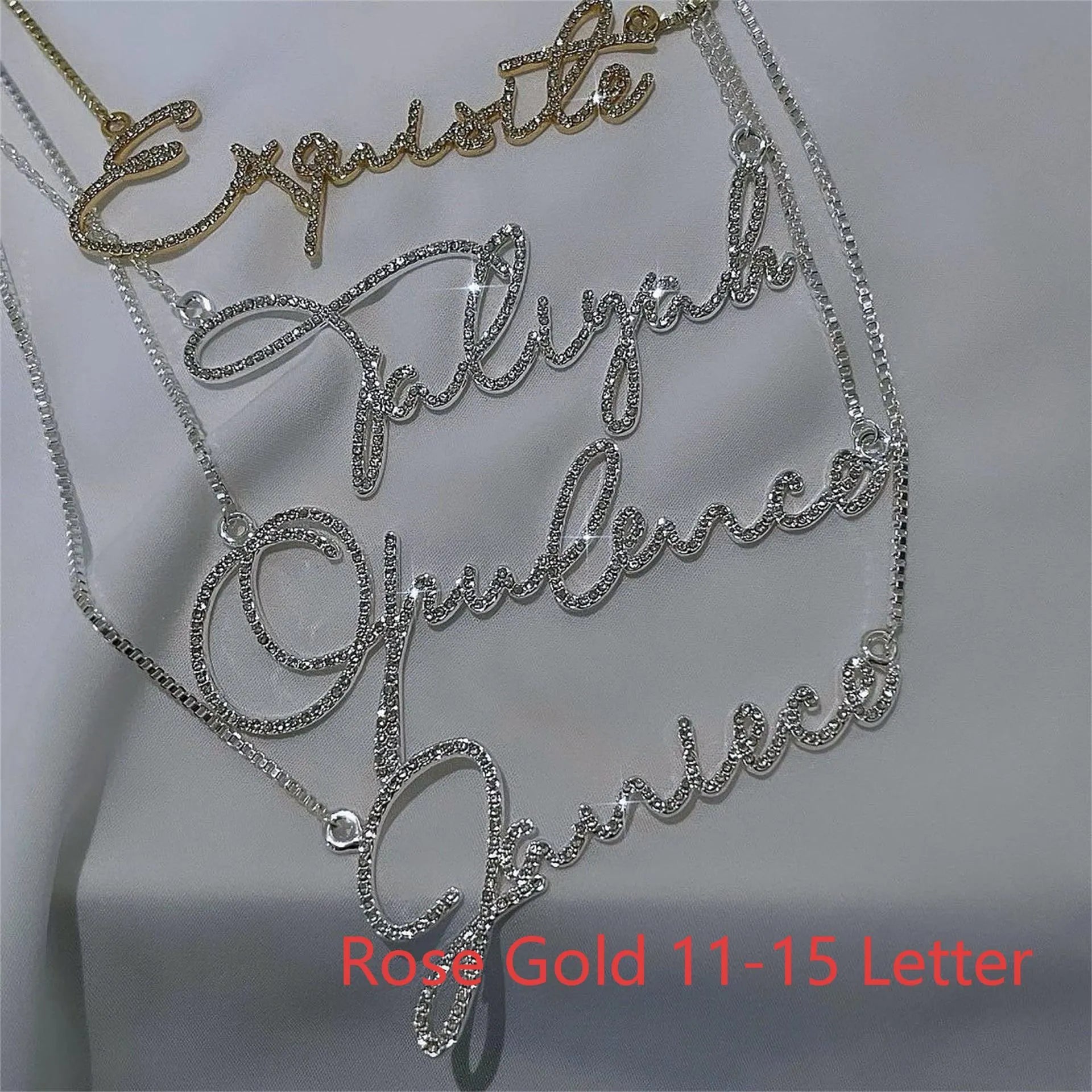 Stainless steel personalised name necklace with diamond studs on a silver chain, showing the letter 'A'.