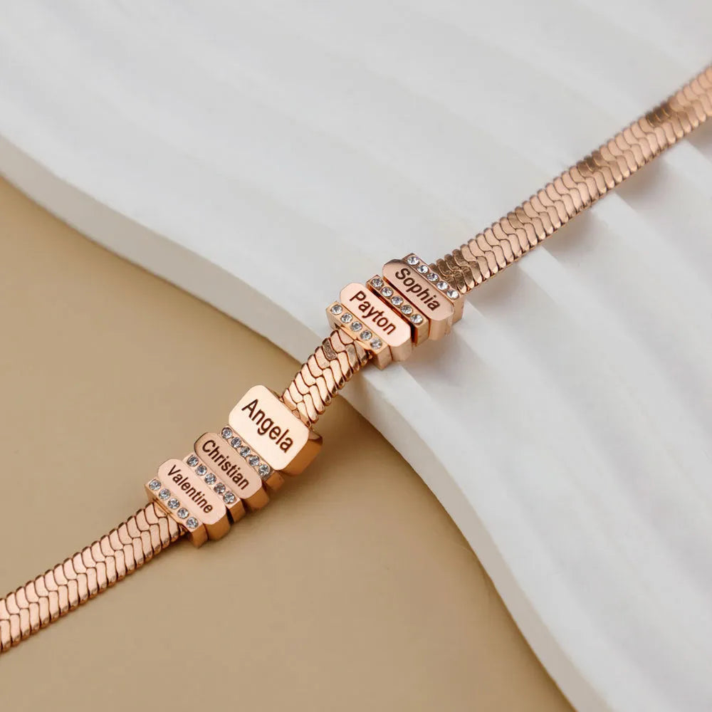 Custom names beaded stainless steel bracelet in steel colour with engraved beads