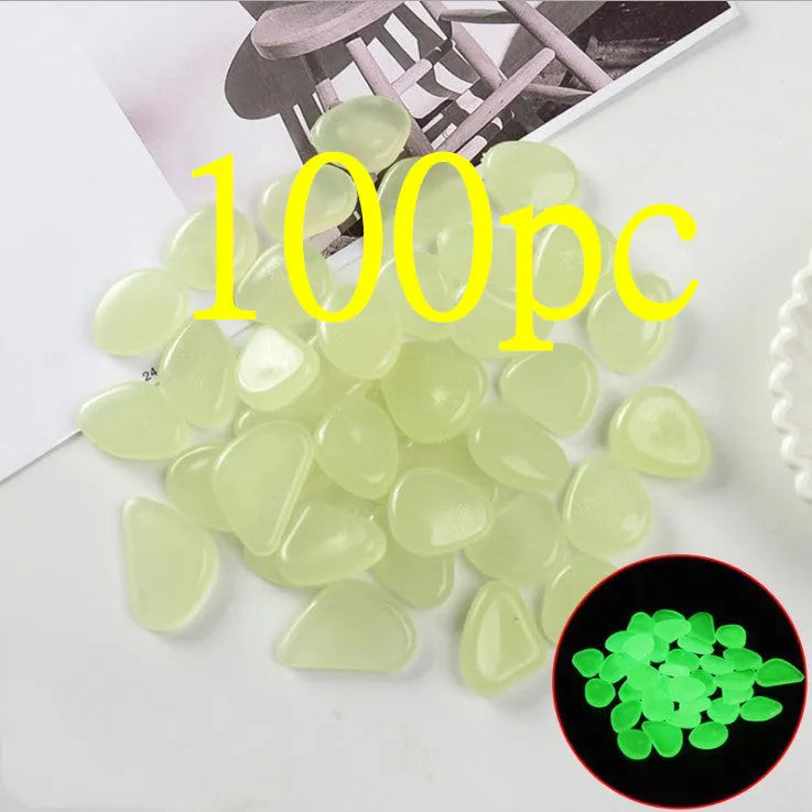 Luminous fluorescent aquarium and garden pebbles in mixed colours including dark purple, yellow, light blue, pink, orange