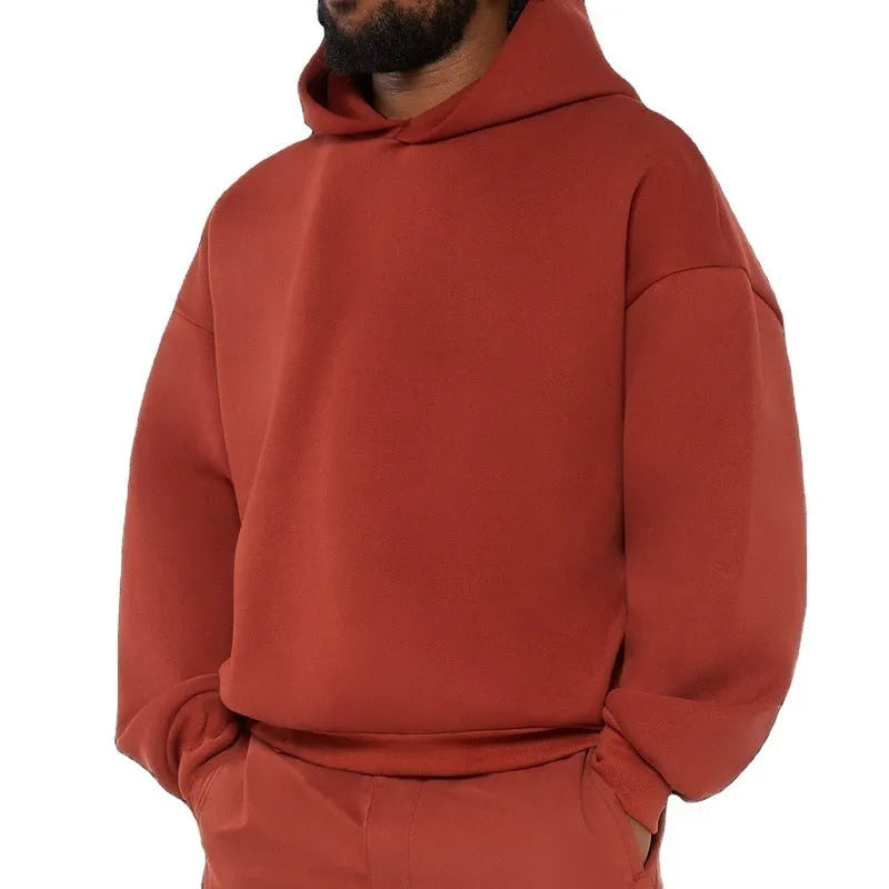 Men's grey fleece-lined cotton hoodie sweater with wool lining, showing pullover design with hood