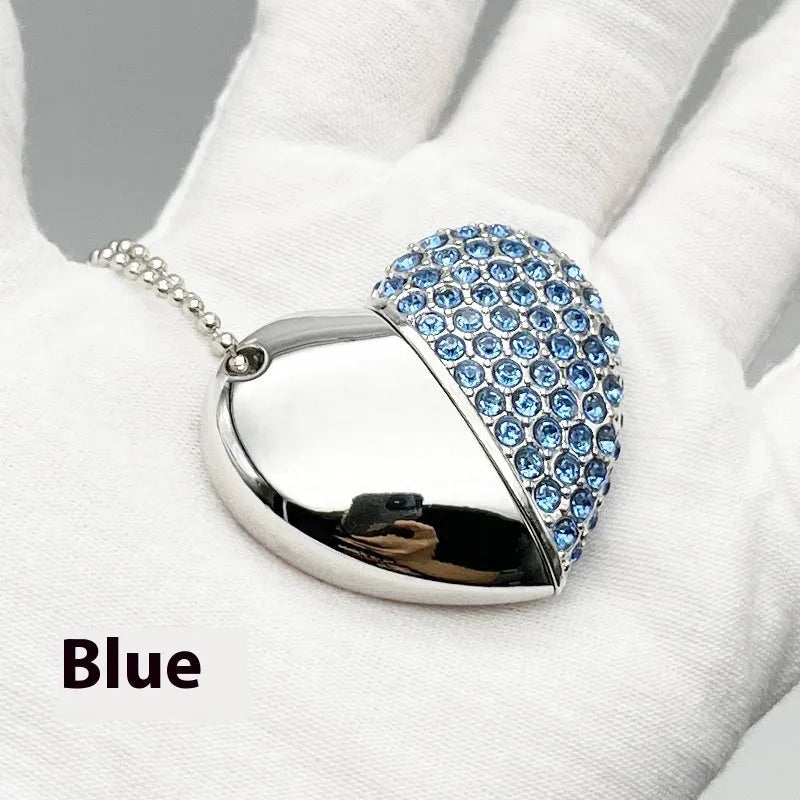 Heart-shaped USB flash drive with brick-inlaid pattern on metal shell, shown in blue colour.
