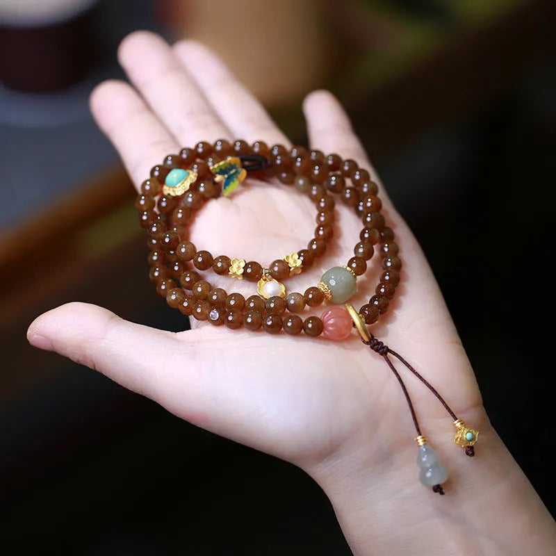 Brown jade Hetian jade three-ring bracelet with silver plated accessories, butterfly and gourd pearl motifs