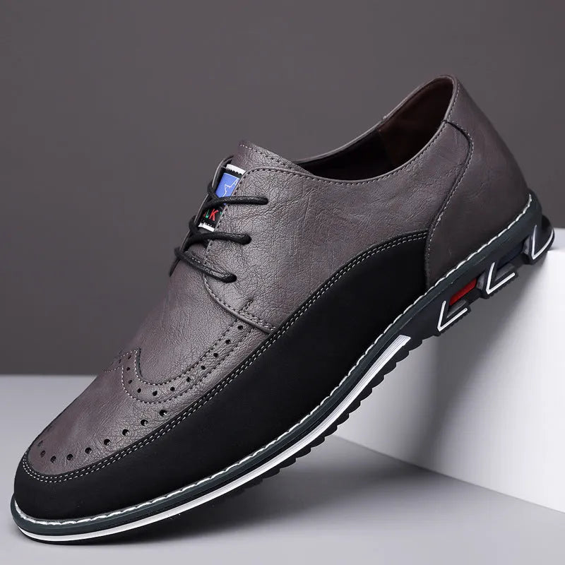 Men's black leather slip-on loafer shoe with a rubber sole and visible stitching detail