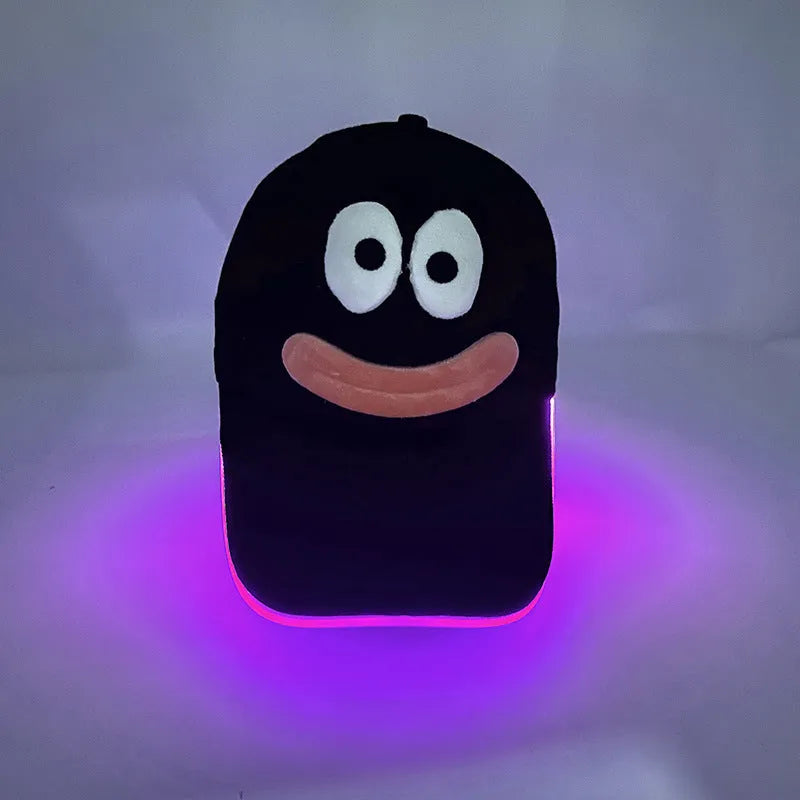 Halloween LED baseball cap showing integrated lighting effects in various pumpkin and solid colour designs