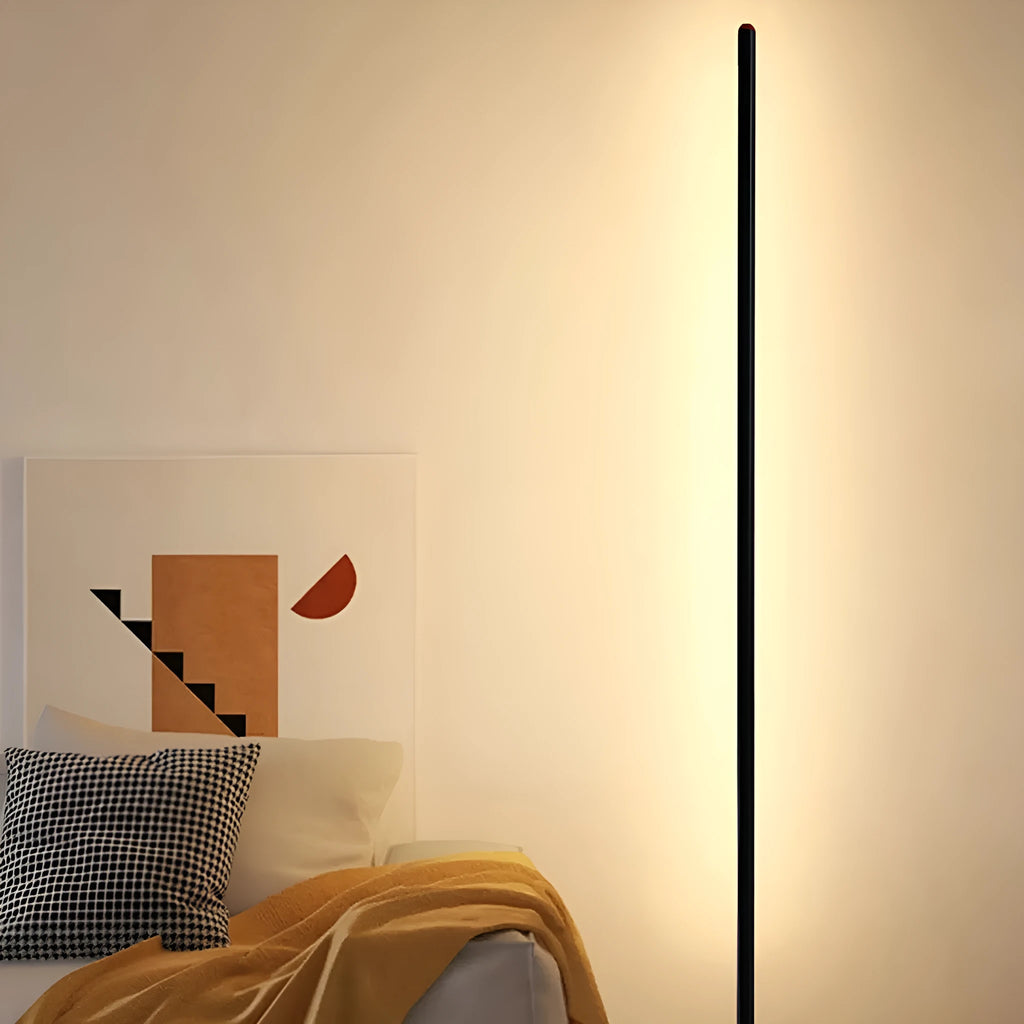 Vertical aluminium alloy floor lamp in modern simple style beside sofa