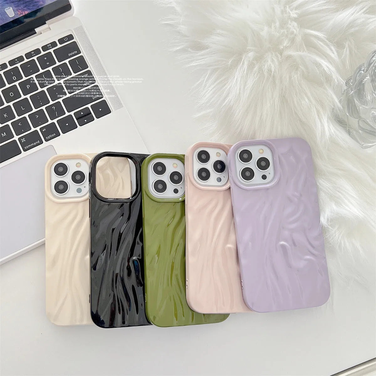 Ins style solid colour water ripple silicone phone case for iPhone models on a plain background.