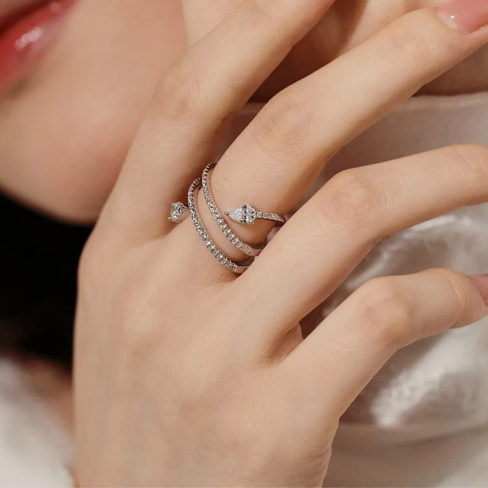 Sterling silver S925 drop-shaped ring in white gold colour on display