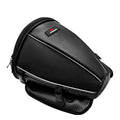 Black motorcycle seat bag with reflective strips, showing multiple pockets and an adjustable shoulder strap.