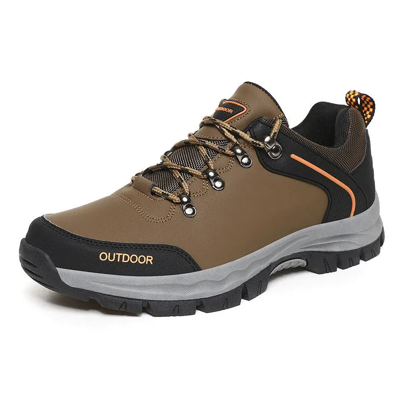 Men's black hiking shoes with synthetic leather upper and non-slip TPR outsole on outdoor trail