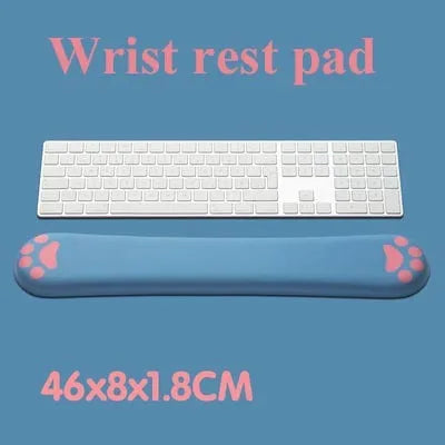Cat's Claw cartoon design memory foam keyboard wrist rest pad in blue, shown on a desk.