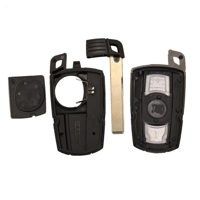 CAS3 semi-intelligent remote car key fob for BMW with three blank metal keys.