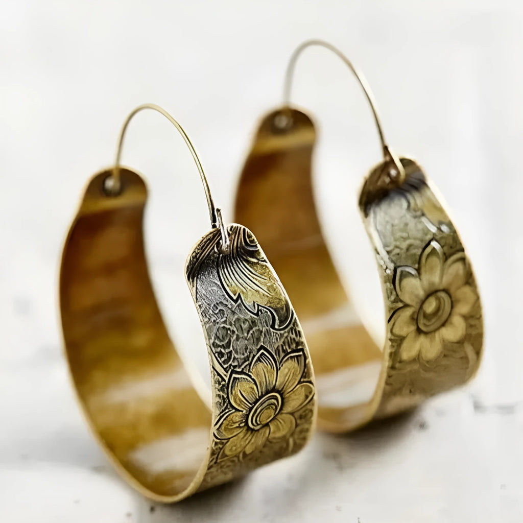 Gold geometric petal earrings with hollow pattern Maillard design