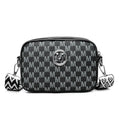 Black wide-strap crossbody bag made of PU leather, showing the three-dimensional outer pocket and adjustable shoulder strap.