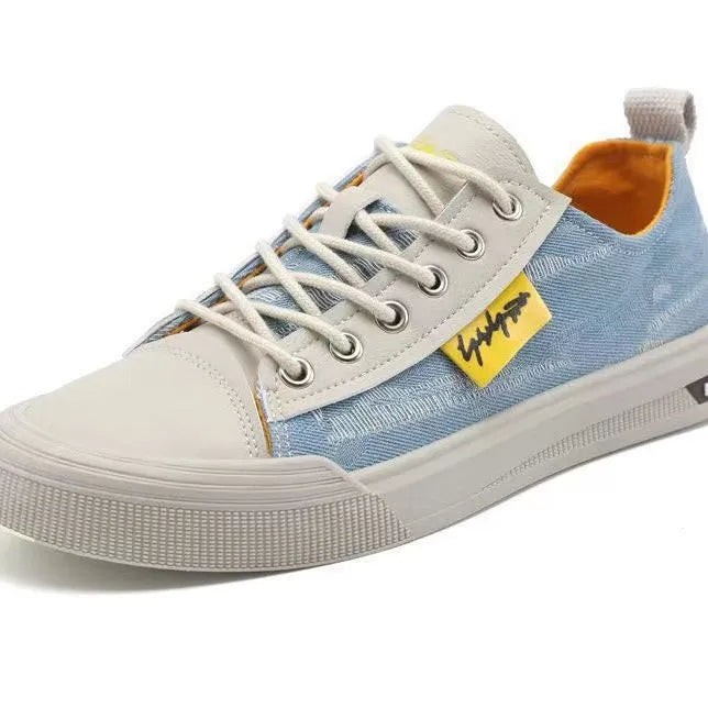 Men's casual canvas shoes in light blue with round toe, rubber sole, and lace-up closure.