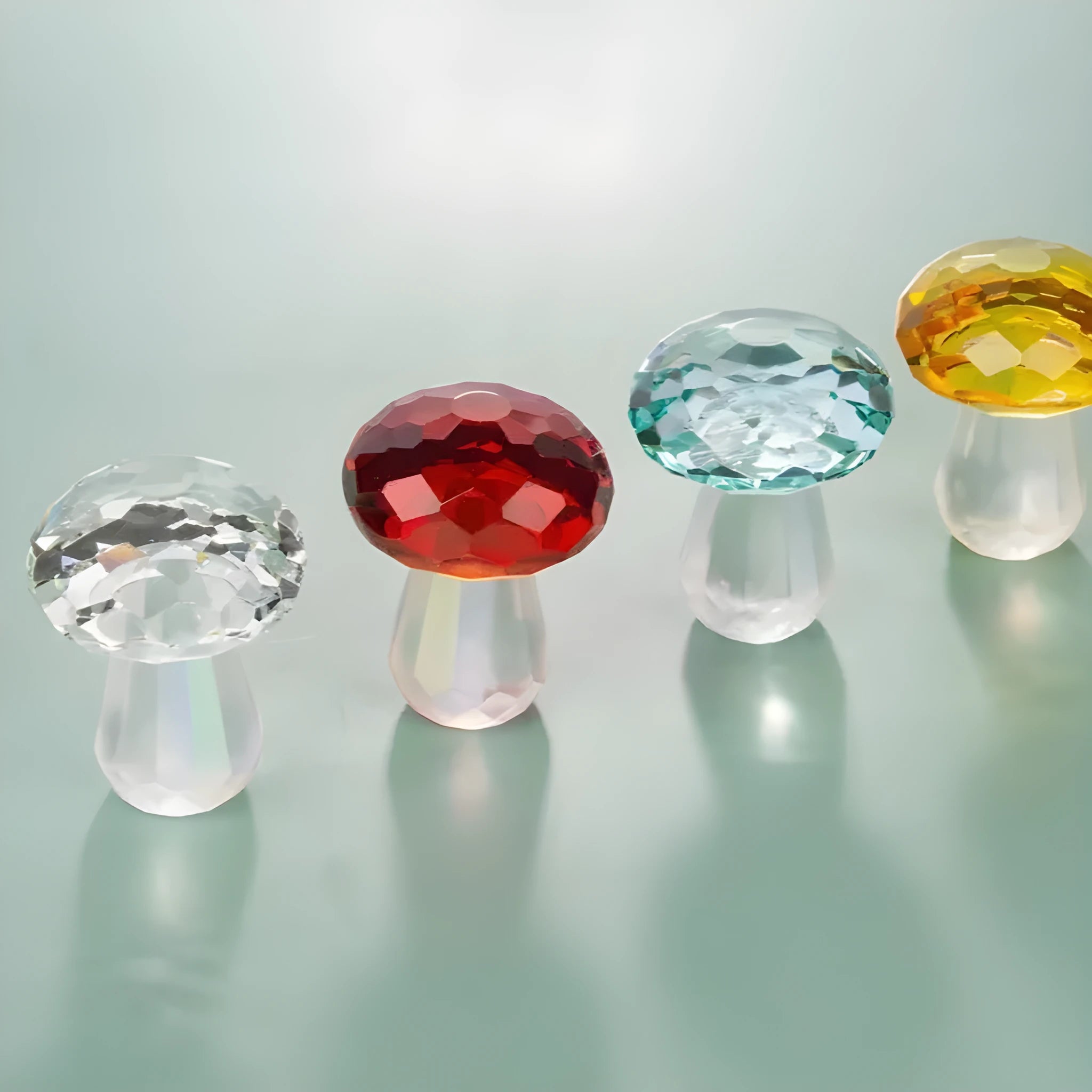 Colourful transparent crystal mushroom decoration on a white background.