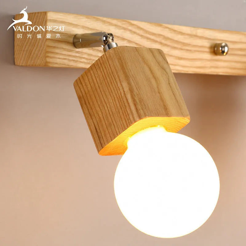 Mirror finish LED wall lamp with single head, 24cm size, showing white light illumination