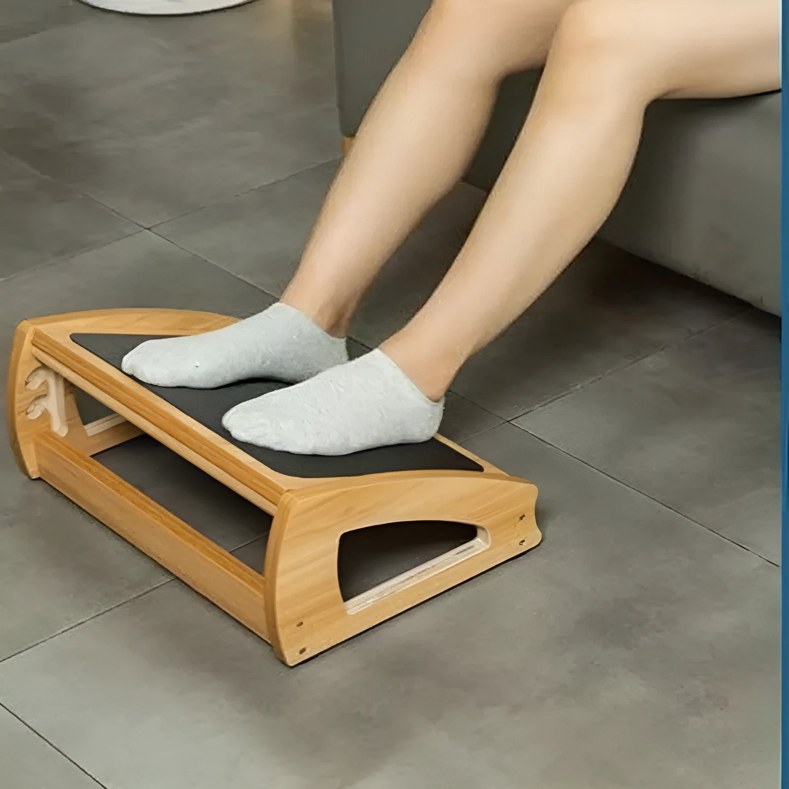 Wooden adjustable bamboo desk footstool in natural wood colour for adult office use