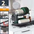 White carbon steel double-layer kitchen storage rack with removable draining tray on countertop