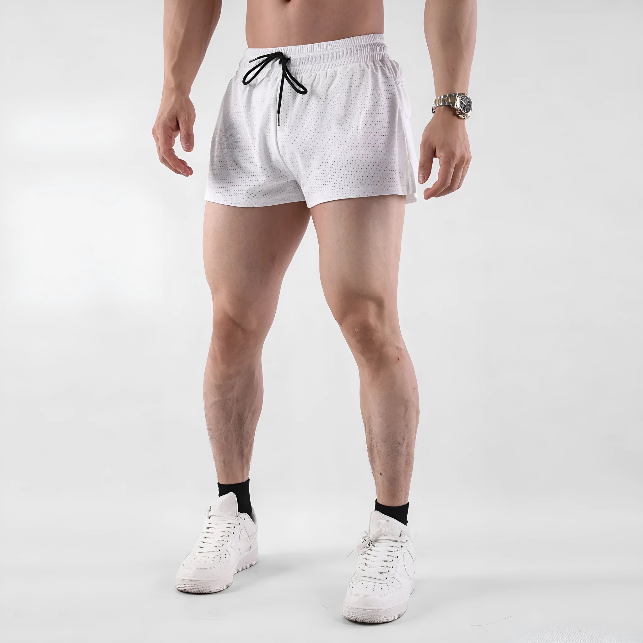Men's black quick-drying nylon summer shorts on a mid-waist fit model.