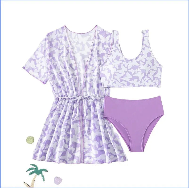 Girls three piece polyester swimsuit set comprising a coat, vest, and pants in colour 3218