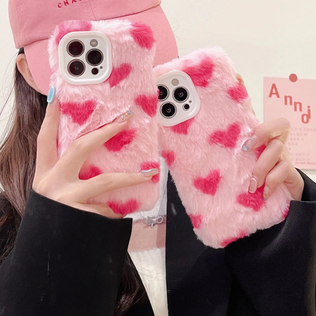 Pink silicone iPhone case with Love Plush cartoon design, shown as a back cover.