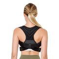 Anti-humpback correction belt in black polyester-nylon for posture support with open shoulders and high chest
