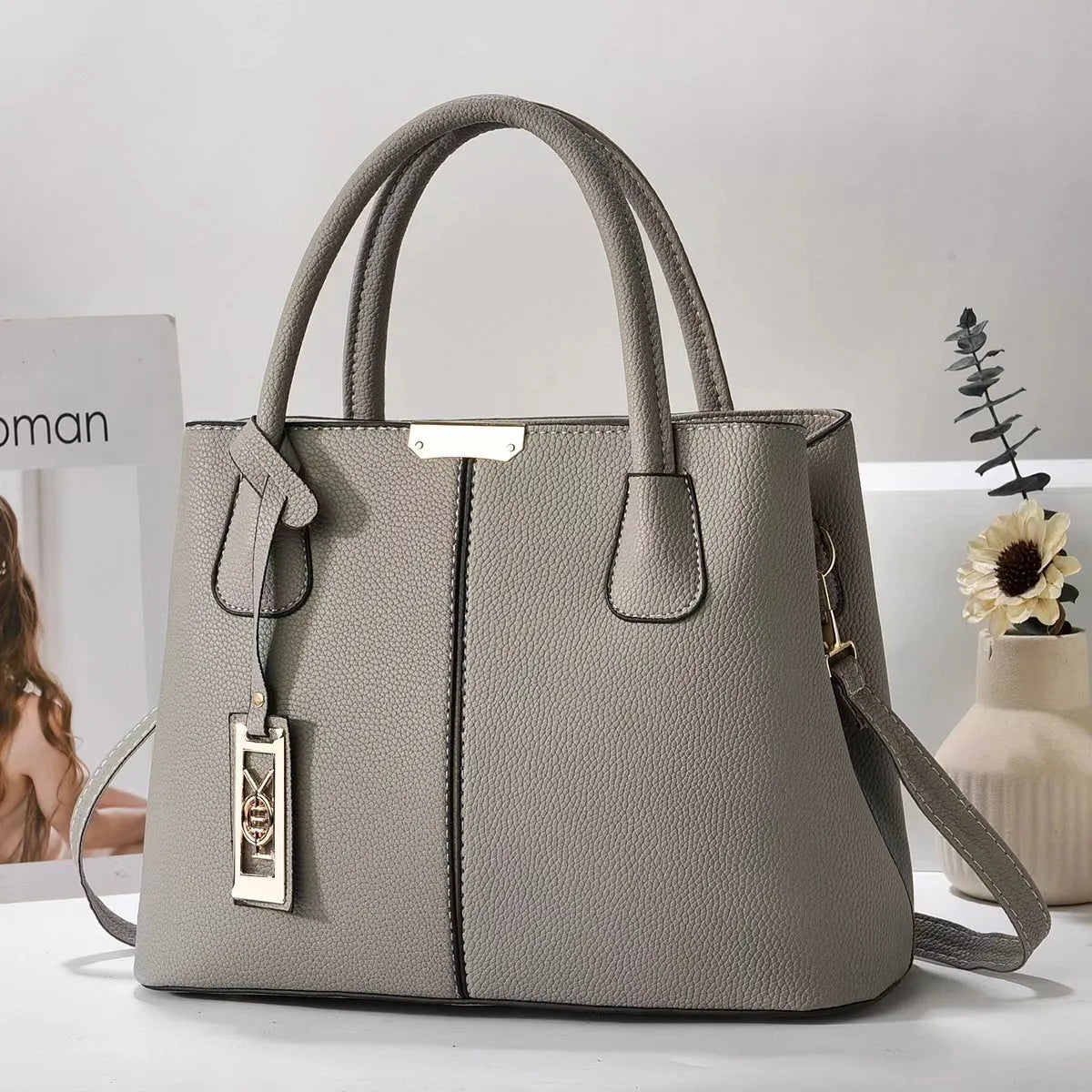 Women's large capacity shoulder bag in soft PU leather with adjustable strap and multiple colour options